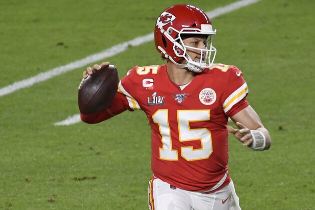 MIAMI, FLORIDA - FEBRUARY 02: Patrick Mahomes #15 of the Kansas City Chiefs looks to pass against the San Francisco 49ers in Super Bowl LIV at Hard Rock Stadium on February 02, 2020 in Miami, Florida. The Chiefs won the game 31-20. (Photo by Focus on Sport/Getty Images)