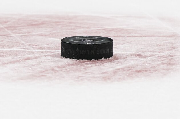 VANCOUVER, BC - FEBRUARY 08: A hockey puck on the ice is shown during NHL action at Rogers Arena on February 8, 2020 in Vancouver, Canada. (Photo by Rich Lam/Getty Images)