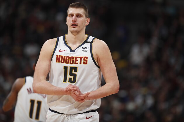 Denver Nuggets center Nikola Jokic (15) in the second half of an NBA basketball game Monday, March 9, 2020, in Denver. The Nuggets won 109-95. (AP Photo/David Zalubowski)