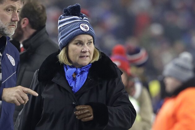 Tennessee Titans owner Amy Adams Strunk walks on the field before an NFL wild-card playoff football game against the New England Patriots, Saturday, Jan. 4, 2020, in Foxborough, Mass. (AP Photo/Steven Senne)