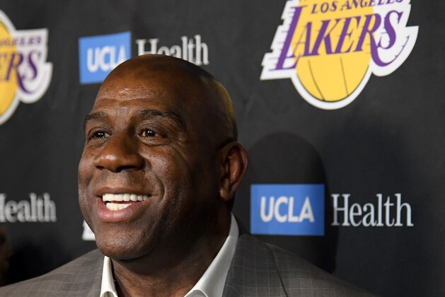 LOS ANGELES, CALIFORNIA - APRIL 09:  Magic Johnson reacts as he speaks to the press resigning as Los Angeles Lakers President of Basketball Operations before the game against the Portland Trail Blazers at Staples Center on April 09, 2019 in Los Angeles, California. (Photo by Harry How/Getty Images)  NOTE TO USER: User expressly acknowledges and agrees that, by downloading and or using this photograph, User is consenting to the terms and conditions of the Getty Images License Agreement.