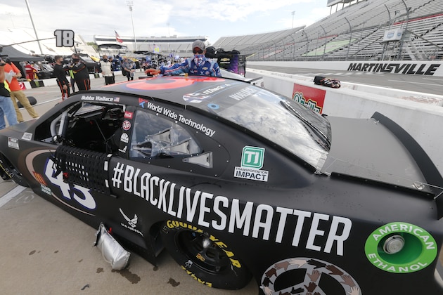 The car for driver Bubba Wallace has a Black Lives Matter logo as it is prepared for a NASCAR Cup Series auto race Wednesday, June 10, 2020, in Martinsville, Va. (AP Photo/Steve Helber) The car for driver Bubba Wallace has a Black Lives Matter logo as it is prepared for a NASCAR Cup Series auto race Wednesday, June 10, 2020, in Martinsville, Va. (AP Photo/Steve Helber)