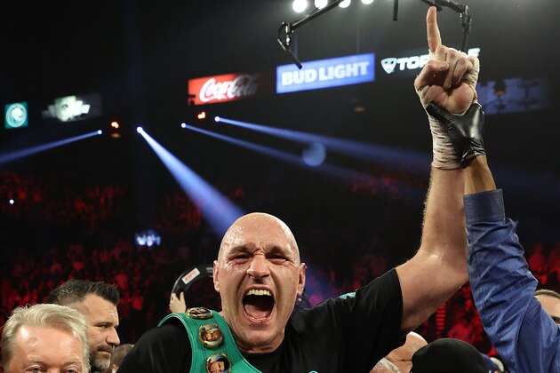 LAS VEGAS, NEVADA - FEBRUARY 22: Tyson Fury celebrates his win by TKO in the seventh round against Deontay Wilder in the Heavyweight bout for Wilder's WBC and Fury's lineal heavyweight title on February 22, 2020 at MGM Grand Garden Arena in Las Vegas, Nevada. (Photo by Al Bello/Getty Images) LAS VEGAS, NEVADA - FEBRUARY 22: Tyson Fury celebrates his win by TKO in the seventh round against Deontay Wilder in the Heavyweight bout for Wilder's WBC and Fury's lineal heavyweight title on February 22, 2020 at MGM Grand Garden Arena in Las Vegas, Nevada. (Photo by Al Bello/Getty Images)