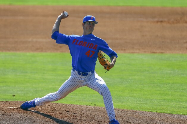 Florida pitcher Tommy Mace throws a pitch during the second inning of the Southeastern Conference tournament NCAA college baseball game against Texas A&M, Tuesday, May 21, 2019, in Birmingham, Ala. (AP Photo/Butch Dill)
