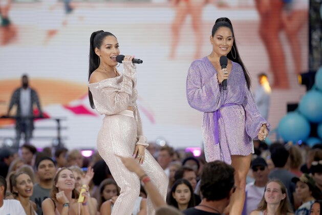 Nikki Bella, left, and Brie Bella introduce a performance by Blanco Brown at the Teen Choice Awards on Sunday, Aug. 11, 2019, in Hermosa Beach, Calif. (Photo by Danny Moloshok/Invision/AP) Nikki Bella, left, and Brie Bella introduce a performance by Blanco Brown at the Teen Choice Awards on Sunday, Aug. 11, 2019, in Hermosa Beach, Calif. (Photo by Danny Moloshok/Invision/AP)