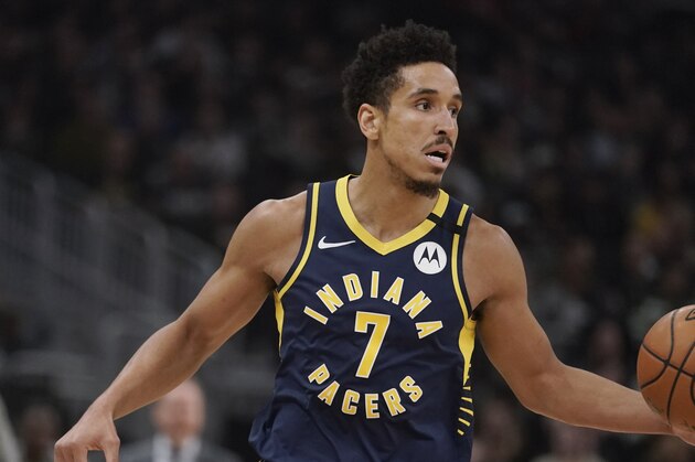 Indiana Pacers' Malcolm Brogdon dribbles during the second half of an NBA basketball game against the Milwaukee Bucks Wednesday, March 4, 2020, in Milwaukee. The Bucks won 119-100. (AP Photo/Morry Gash)