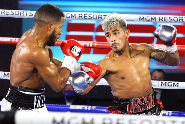 LAS VEGAS, NEVADA - JUNE 11: In this handout image provided by Top Rank, Jessie Magdaleno fights Yenifel Vicente during their featherweight bout at MGM Grand Conference Center Grand Ballroom on June 11, 2020 in Las Vegas, Nevada. (Photo by Mikey Williams/Top Rank via Getty Images)
