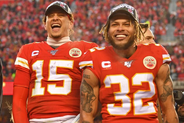 KANSAS CITY, MO - JANUARY 19: Quarterback Patrick Mahomes #15 and strong safety Tyrann Mathieu #32 of the Kansas City Chiefs celebrate after beating the Tennessee Titans in the AFC Championship Game at Arrowhead Stadium on January 19, 2020 in Kansas City, Missouri. (Photo by Peter G. Aiken/Getty Images)