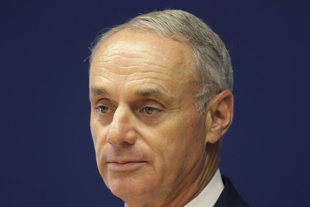 Major League Baseball commissioner Rob Manfred speaks to reporters after a meeting of baseball team owners in New York, Thursday, June 20, 2019. The Tampa Bay Rays have received permission from Major League Baseball's executive council to explore a plan that could see the team split its home games between the Tampa Bay area and Montreal, reports said Thursday. (AP Photo/Seth Wenig) Major League Baseball commissioner Rob Manfred speaks to reporters after a meeting of baseball team owners in New York, Thursday, June 20, 2019. The Tampa Bay Rays have received permission from Major League Baseball's executive council to explore a plan that could see the team split its home games between the Tampa Bay area and Montreal, reports said Thursday. (AP Photo/Seth Wenig)