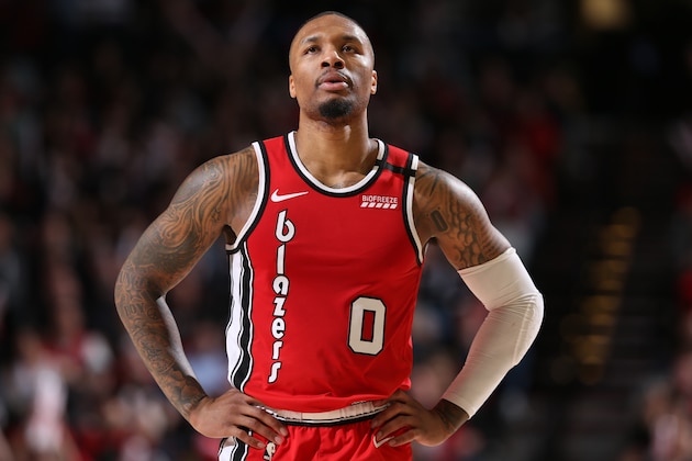 PORTLAND, OR - MARCH 10: Damian Lillard #0 of the Portland Trail Blazers looks on during the game on March 10 , 2020 at the Moda Center Arena in Portland, Oregon. NOTE TO USER: User expressly acknowledges and agrees that, by downloading and or using this photograph, user is consenting to the terms and conditions of the Getty Images License Agreement. Mandatory Copyright Notice: Copyright 2020 NBAE (Photo by Sam Forencich/NBAE via Getty Images)