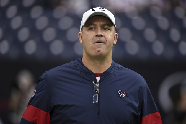 Houston Texans head coach Bill O'Brien watches his team warm up before an NFL wild-card playoff football game against the Buffalo Bills Saturday, Jan. 4, 2020, in Houston. (AP Photo/Eric Christian Smith)