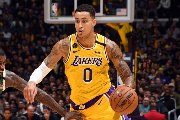 LOS ANGELES, CA - MARCH 6: Kyle Kuzma #0 of the Los Angeles Lakers handles the ball during the game against the Milwaukee Bucks on March 6, 2020 at STAPLES Center in Los Angeles, California. NOTE TO USER: User expressly acknowledges and agrees that, by downloading and/or using this Photograph, user is consenting to the terms and conditions of the Getty Images License Agreement. Mandatory Copyright Notice: Copyright 2020 NBAE (Photo by Andrew D. Bernstein/NBAE via Getty Images) LOS ANGELES, CA - MARCH 6: Kyle Kuzma #0 of the Los Angeles Lakers handles the ball during the game against the Milwaukee Bucks on March 6, 2020 at STAPLES Center in Los Angeles, California. NOTE TO USER: User expressly acknowledges and agrees that, by downloading and/or using this Photograph, user is consenting to the terms and conditions of the Getty Images License Agreement. Mandatory Copyright Notice: Copyright 2020 NBAE (Photo by Andrew D. Bernstein/NBAE via Getty Images)