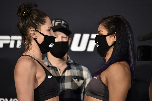 LAS VEGAS, NEVADA - JUNE 12: (L-R) Opponents Jessica Eye and Cynthia Calvillo face off during the UFC Fight Night weigh-in at UFC APEX on June 12, 2020 in Las Vegas, Nevada. (Photo by Chris Unger/Zuffa LLC)