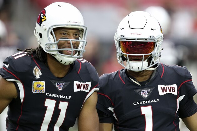 Arizona Cardinals wide receiver Larry Fitzgerald (11) and quarterback Kyler Murray (1) wear a