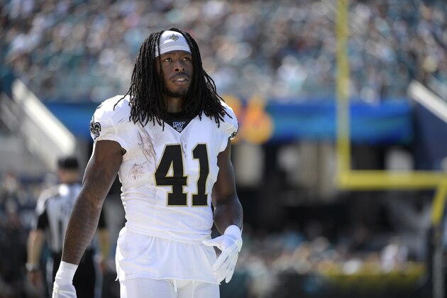 New Orleans Saints running back Alvin Kamara (41) watches from the sideline during the first half of an NFL football game against the Jacksonville Jaguars Sunday, Oct. 13, 2019, in Jacksonville, Fla. (AP Photo/Phelan M. Ebenhack)