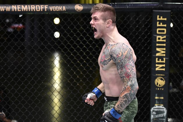 LAS VEGAS, NEVADA - JUNE 13: In this handout image provided by UFC, Marvin Vettori of Italy celebrates after his submission victory over Karl Roberson in their middleweight fight during the UFC Fight Night event at UFC APEX on June 13, 2020 in Las Vegas, Nevada. (Photo by Chris Unger/Zuffa LLC via Getty Images)