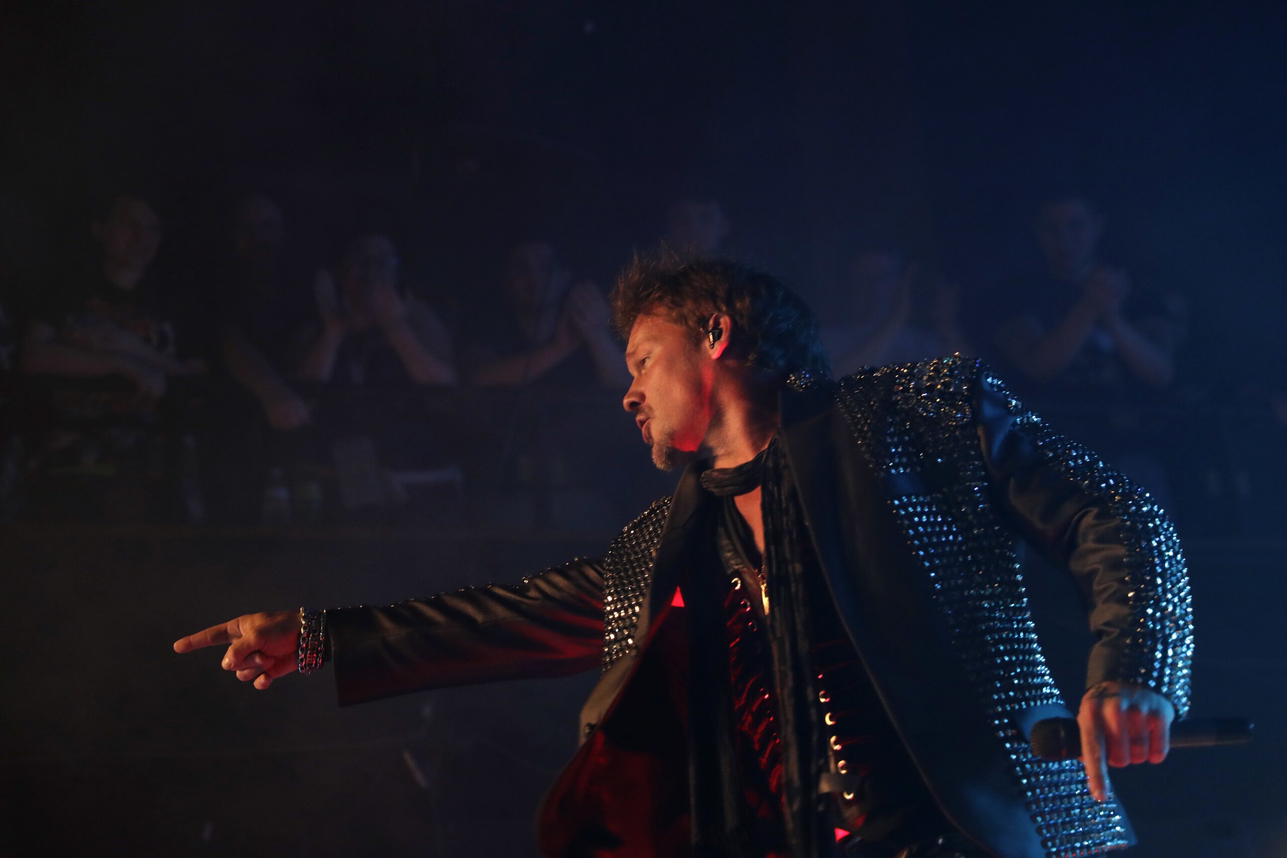 In this Wednesday, May 17, 2017, photo, lead singer Chris Jericho of the band Fozzy performs onstage at the Chameleon Club in Lancaster, Pa.   Jericho has entertained professional wrestling fans for 25 years, winning championships and shining each year at WrestleMania. He has traded wrestling for rock this summer and is on tour with his band. (AP Photo/Matt Slocum)