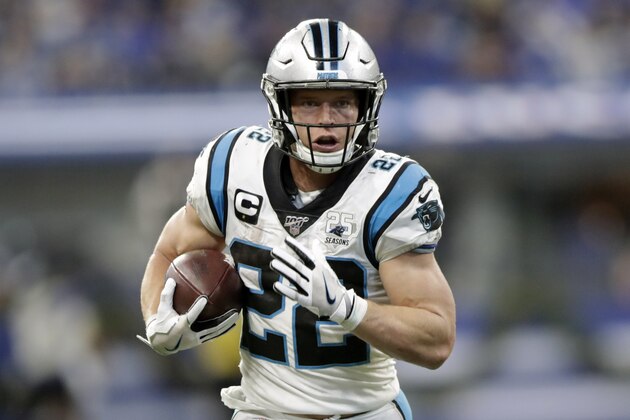 FILE - In this Dec. 22, 2019, file photo, Carolina Panthers' Christian McCaffrey runs during the second half of an NFL football game against the Indianapolis Colts, in Indianapolis. McCaffrey's versatility and superb statistics helped him to a rare double: The Carolina Panthers running back has made The Associated Press NFL All-Pro Team at two positions. (AP Photo/Michael Conroy, File)