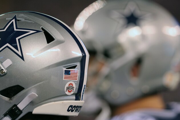 EAST RUTHERFORD, NEW JERSEY - NOVEMBER 04: Detail view of a College Football logo sticker on the helmet of the Dallas Cowboys in the game against the New York Giants in the first half at MetLife Stadium on November 04, 2019 in East Rutherford, New Jersey.The Dallas Cowboys defeated the New York Giants 37-18. (Photo by Al Pereira/Getty Images)