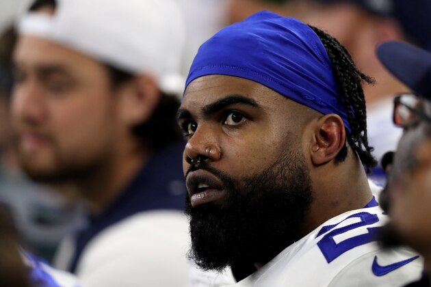 ARLINGTON, TEXAS - DECEMBER 29: Ezekiel Elliott #21 of the Dallas Cowboys looks on from the bench in the third quarter against the Washington Redskins in the game at AT&T Stadium on December 29, 2019 in Arlington, Texas. (Photo by Tom Pennington/Getty Images) ARLINGTON, TEXAS - DECEMBER 29: Ezekiel Elliott #21 of the Dallas Cowboys looks on from the bench in the third quarter against the Washington Redskins in the game at AT&T Stadium on December 29, 2019 in Arlington, Texas. (Photo by Tom Pennington/Getty Images)