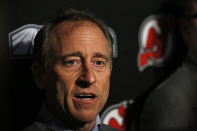 New Jersey Devils owner Josh Harris speaks to announce interim general manager Tom Fitzgerald to replace Ray Shero prior to an NHL hockey game Sunday, Jan. 12, 2020, in Newark, N.J. (AP Photo/Adam Hunger) New Jersey Devils owner Josh Harris speaks to announce interim general manager Tom Fitzgerald to replace Ray Shero prior to an NHL hockey game Sunday, Jan. 12, 2020, in Newark, N.J. (AP Photo/Adam Hunger)