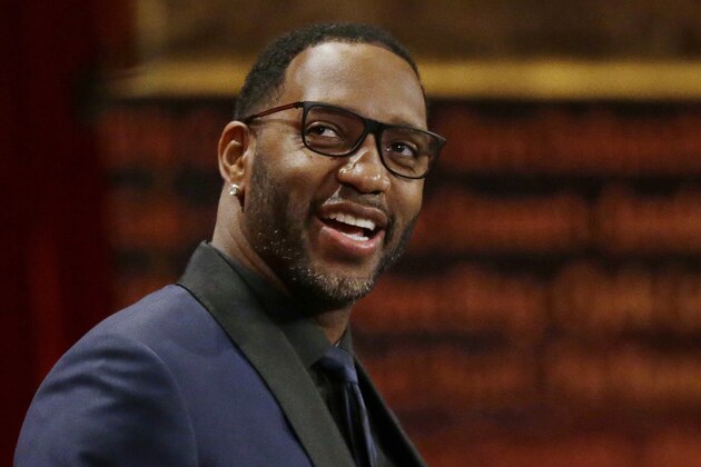 Tracy McGrady smiles as he speaks during his enshrinement into the Naismith Memorial Basketball Hall of Fame on Friday, Sept. 8, 2017, in Springfield, Mass. McGrady is a seven-time NBA All-Star and a two-time NBA scoring champion who played for seven NBA teams in his 16 season pro career. (AP Photo/Stephan Savoia)