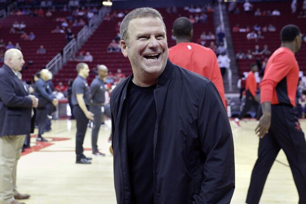 New Houston Rockets owner Tilman Fertitta before the start of an NBA preseason basketball game against the San Antonio Spurs Friday, Oct. 13, 2017, in Houston. (AP Photo/Michael Wyke)