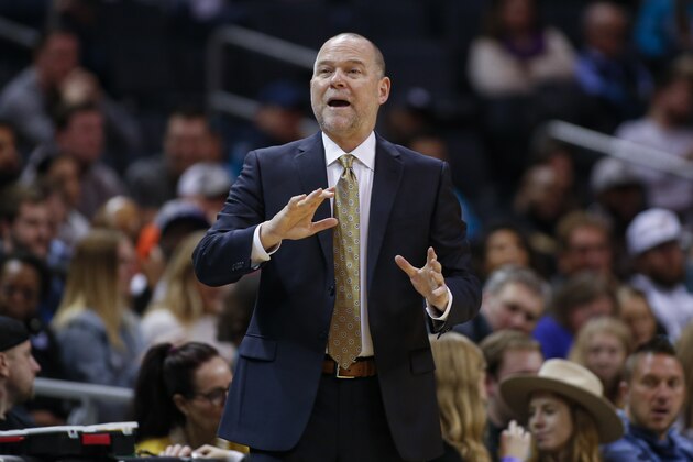 Denver Nuggets head coach Michael Malone directs his team against the Charlotte Hornets during the second half of an NBA basketball game in Charlotte, N.C., Thursday, March 5, 2020. Denver won 114-112. (AP Photo/Nell Redmond)