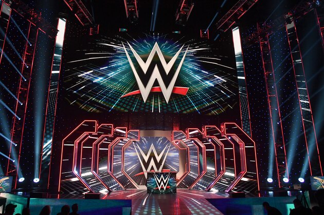 LAS VEGAS, NEVADA - OCTOBER 11:  WWE logos are shown on screens before a WWE news conference at T-Mobile Arena on October 11, 2019 in Las Vegas, Nevada. It was announced that WWE wrestler Braun Strowman will face heavyweight boxer Tyson Fury and WWE champion Brock Lesnar will take on former UFC heavyweight champion Cain Velasquez at the WWE's Crown Jewel event at Fahd International Stadium in Riyadh, Saudi Arabia on October 31.  (Photo by Ethan Miller/Getty Images)