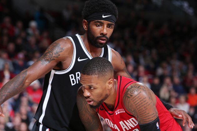PORTLAND, OR - NOVEMBER 8: Kyrie Irving #11 of the Brooklyn Nets and Damian Lillard #0 of the Portland Trail Blazers seen on court on November 8, 2019 at the Moda Center Arena in Portland, Oregon. NOTE TO USER: User expressly acknowledges and agrees that, by downloading and or using this photograph, user is consenting to the terms and conditions of the Getty Images License Agreement. Mandatory Copyright Notice: Copyright 2019 NBAE (Photo by Sam Forencich/NBAE via Getty Images)