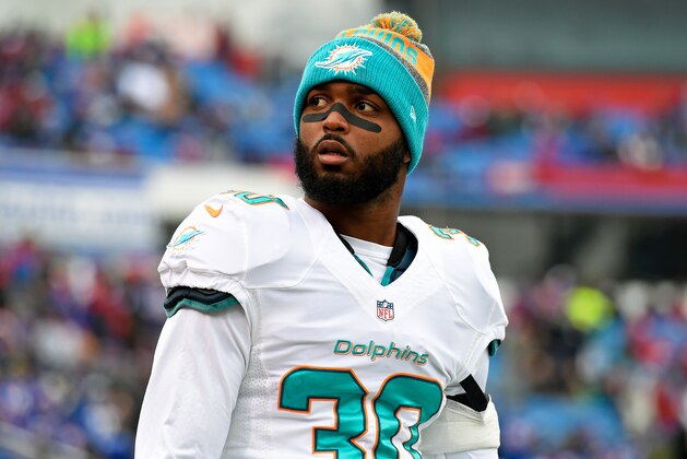 ORCHARD PARK, NY - DECEMBER 24:  Bacarri Rambo #30 of the Miami Dolphins walks on the field prior to the game against the Buffalo Bills at New Era Field on December 24, 2016 in Orchard Park, New York. The Miami Dolphins defeated the Buffalo Bills 34-31 in overtime. (Photo by Rich Barnes/Getty Images)