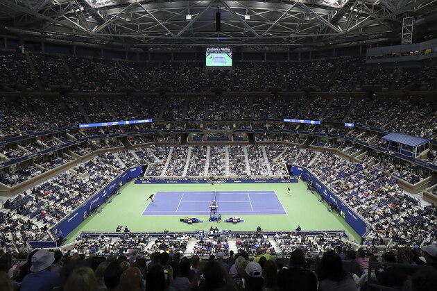 Rafael Nadal, of Spain, and John Millman, of Australia, compete during the first round of the US Open tennis tournament, Tuesday, Aug. 27, 2019, in New York. (AP Photo/Steve Luciano)