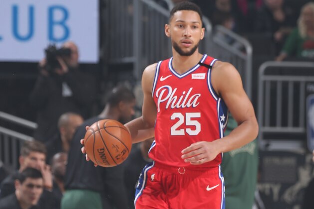 MILWAUKEE, WI - FEBRUARY 22: Ben Simmons #25 of the Philadelphia 76ers handles the ball against the Milwaukee Bucks on February 22, 2020 at the Fiserv Forum in Milwaukee, Wisconsin. NOTE TO USER: User expressly acknowledges and agrees that, by downloading and or using this photograph, user is consenting to the terms and conditions of the Getty Images License Agreement.  Mandatory Copyright Notice: Copyright 2020 NBAE (Photo by Gary Dineen/NBAE via Getty Images)