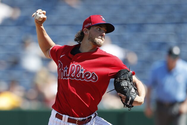 Philadelphia Phillies starting pitcher Aaron Nola throws during the third inning of a spring training baseball game against the Pittsburgh Pirates, Wednesday, March 4, 2020, in Clearwater, Fla. (AP Photo/Carlos Osorio)