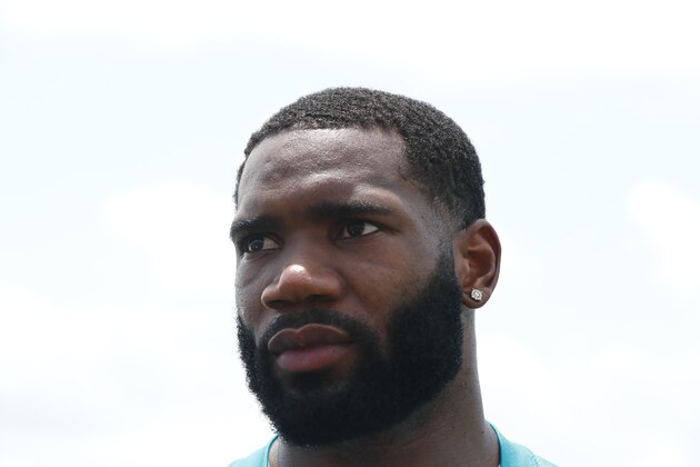 Miami Dolphins cornerback Xavien Howard (25) speaks to the media during an NFL organized team activities football practice on Tuesday, May 14, 2019, in Davie, Fla. (AP Photo/Brynn Anderson)