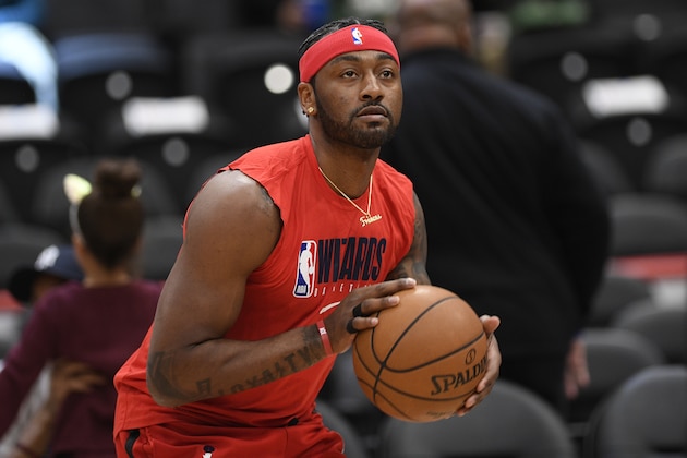 Washington Wizards guard John Wall works out prior to an NBA basketball game against the Milwaukee Bucks, Monday, Feb. 24, 2020, in Washington. (AP Photo/Nick Wass)