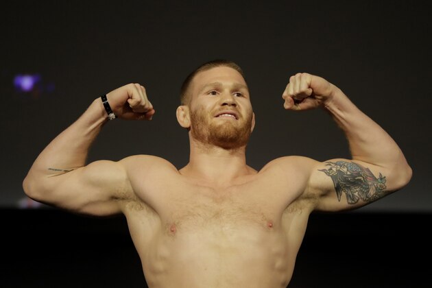 Matt Frevola stands atop a scale during the weigh-ins ahead his lightweight mixed martial arts bout against Lando Vannata at UFC 230, Friday, Nov. 2, 2018, at Madison Square Garden in New York. (AP Photo/Julio Cortez)