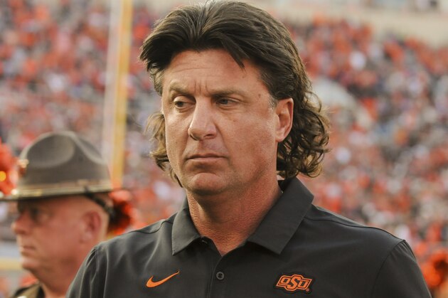 Oklahoma State head coach Mike Gundy takes the field prior to an NCAA college football game in Stillwater, Okla., Saturday, Sept. 28, 2019. (AP Photo/Brody Schmidt)