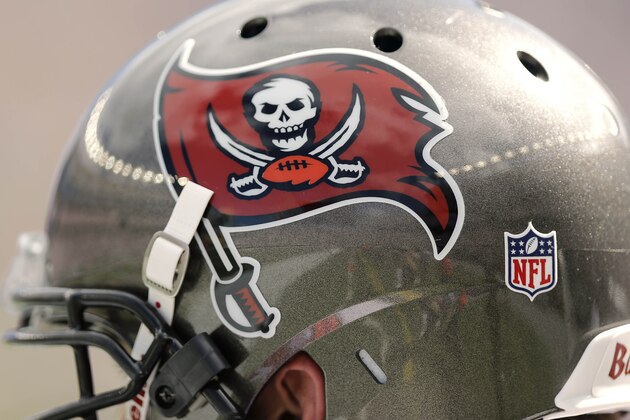 FOXBORO, MA - SEPTEMBER 22:  A Tampa Bay Buccaneers helmet and logo are seen during the second half of their 23-3 loss to the New England Patriots  at Gillette Stadium on September 22, 2013 in Foxboro, Massachusetts.  (Photo by Winslow Townson/Getty Images)