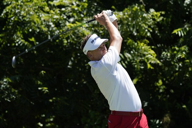 Ian Poulter, of England, tees off on the sixth hole during the first round of the Charles Schwab Challenge golf tournament at the Colonial Country Club in Fort Worth, Texas, Thursday, June 11, 2020. (AP Photo/David J. Phillip)