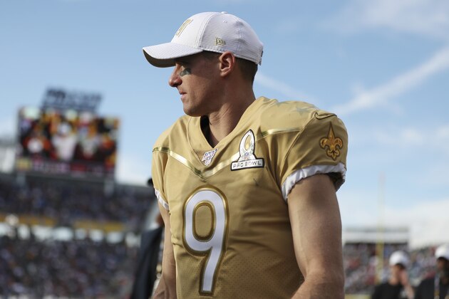 NFC quarterback Drew Brees, of the New Orleans Saints, walks off the field at halftime during the NFL Pro Bowl football game against the AFC, Sunday, Jan. 26, 2020, in Orlando, Fla. (AP Photo/Steve Luciano)