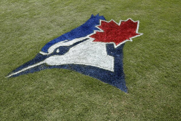 DUNEDIN, FL - FEBRUARY 24: General view of the Toronto Blue Jays logo painted in the grass prior to a Grapefruit League spring training game against the Atlanta Braves at TD Ballpark on February 24, 2020 in Dunedin, Florida. (Photo by Joe Robbins/Getty Images)