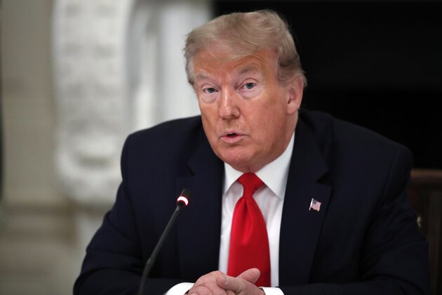 President Donald Trump speaks during a roundtable with governors on the reopening of America's small businesses, in the State Dining Room of the White House, Thursday, June 18, 2020, in Washington. (AP Photo/Alex Brandon)