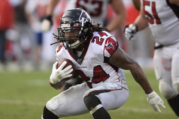 Atlanta Falcons running back Devonta Freeman (24) runs against the Tampa Bay Buccaneers during the second half of an NFL football game Sunday, Dec. 29, 2019, in Tampa, Fla. (AP Photo/Jason Behnken)