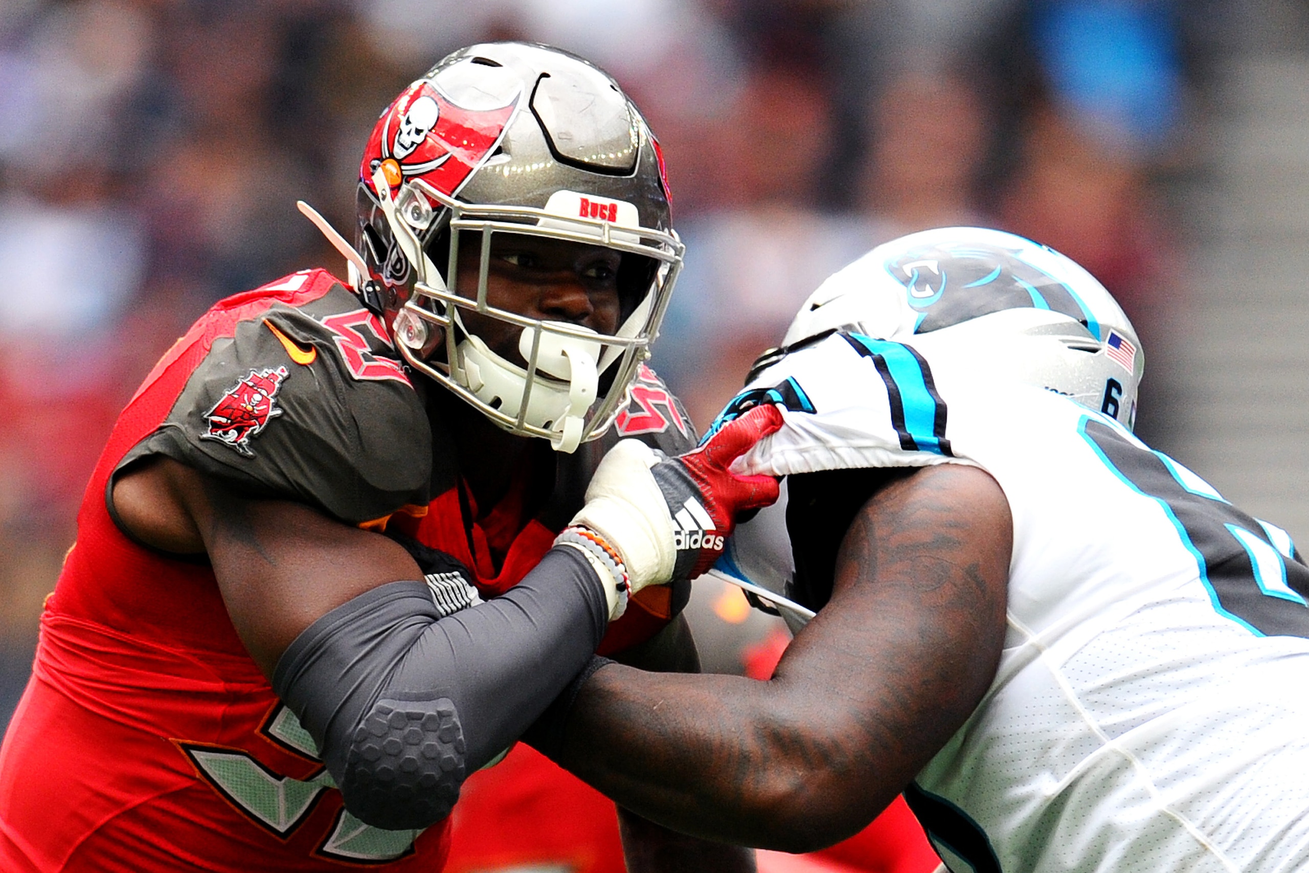 LONDON, ENGLAND - OCTOBER 13: Dennis Daley of Carolina Panthers challenges Shaquil Barrett of Tampa Bay Buccaneers during the NFL match between the Carolina Panthers and Tampa Bay Buccaneers at Tottenham Hotspur Stadium on October 13, 2019 in London, England. (Photo by Alex Burstow/Getty Images) LONDON, ENGLAND - OCTOBER 13: Dennis Daley of Carolina Panthers challenges Shaquil Barrett of Tampa Bay Buccaneers during the NFL match between the Carolina Panthers and Tampa Bay Buccaneers at Tottenham Hotspur Stadium on October 13, 2019 in London, England. (Photo by Alex Burstow/Getty Images)