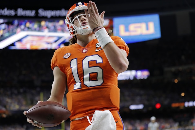 Clemson quarterback Trevor Lawrence celebrates after scoring during the first half of a NCAA College Football Playoff national championship game against LSU Monday, Jan. 13, 2020, in New Orleans. (AP Photo/Gerald Herbert)