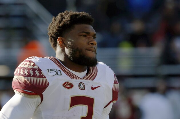 Florida State running back Cam Akers jogs across the field during a timeout in the second half of an NCAA college football game against Boston College, Sunday, Nov. 10, 2019, in Boston. (AP Photo/Bill Sikes)