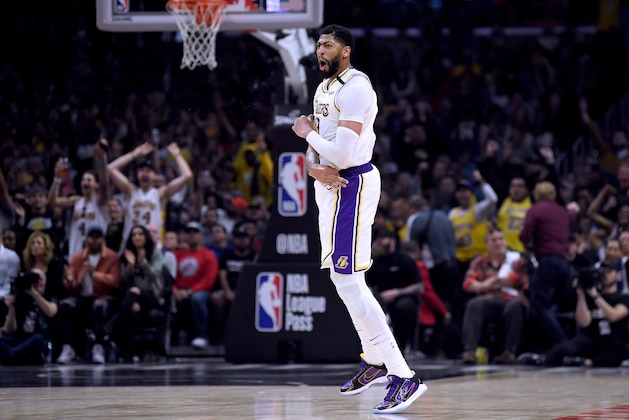 LOS ANGELES, CALIFORNIA - MARCH 08:  Anthony Davis #3 of the Los Angeles Lakers celebrates his three pointer during a 112-103 win over the LA Clippers at Staples Center on March 08, 2020 in Los Angeles, California.   NOTE TO USER: User expressly acknowledges and agrees that, by downloading and or using this photograph, User is consenting to the terms and conditions of the Getty Images License Agreement.  (Photo by Harry How/Getty Images)