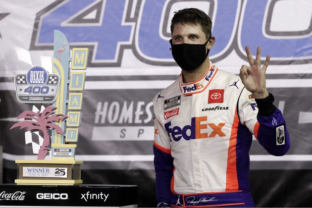 Denny Hamlin celebrates after winning a NASCAR Cup Series auto race Sunday, June 14, 2020, in Homestead, Fla. (AP Photo/Wilfredo Lee)