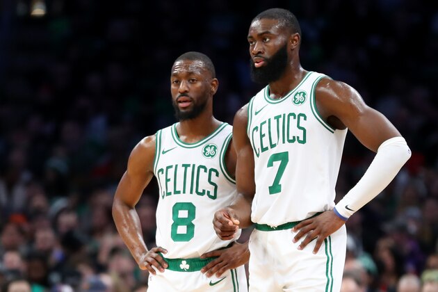 BOSTON, MASSACHUSETTS - DECEMBER 04: Jaylen Brown #7 of the Boston Celtics and Kemba Walker #8 talk during the second half of the game between the Boston Celtics and the Miami Heat at TD Garden on December 04, 2019 in Boston, Massachusetts. The Celtics defeat the Heat 112-93. (Photo by Maddie Meyer/Getty Images)